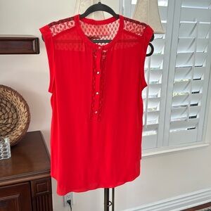 A Rebecca Taylor shirt. Tomato red w a lace
Trim on back and middle front
